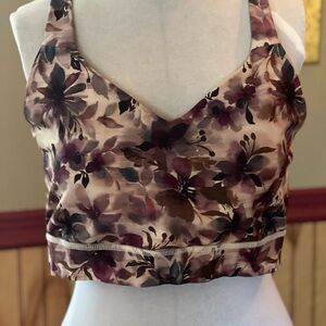 Preowned Linc Active purple ,pink, flowered adjustable sports bra. Size 2XL.